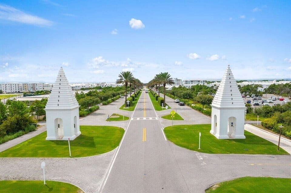 Grand arrival framed by Florida palms.