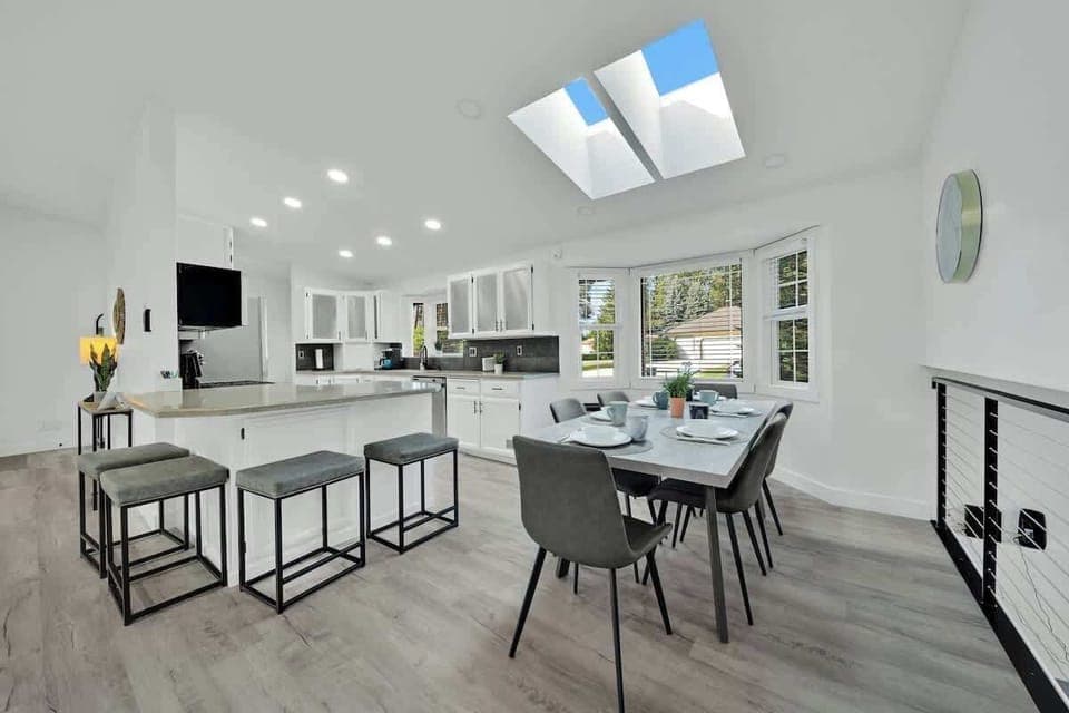 The kitchen is easily accessible from the front door for dropping off groceries, and the bar seating + dining table makes for customizable meal setups. Right next to the living room, your family can socialize however they like!