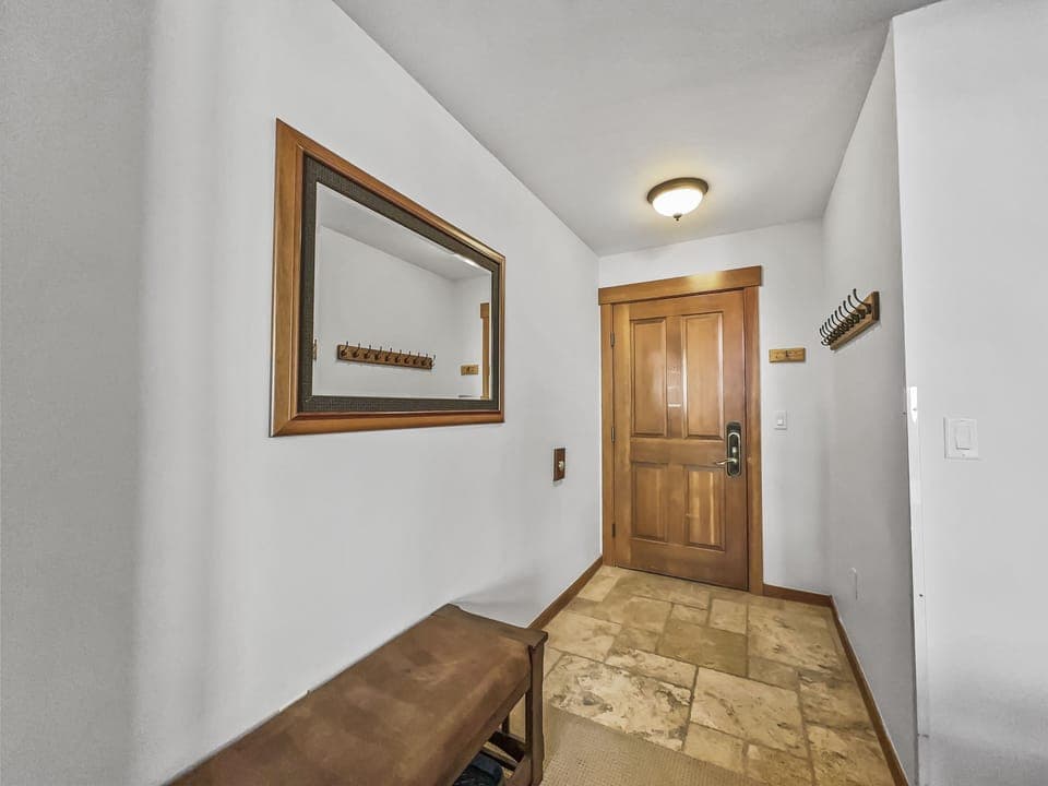 Entry way with bench and plenty of storage for boots and winter gear!