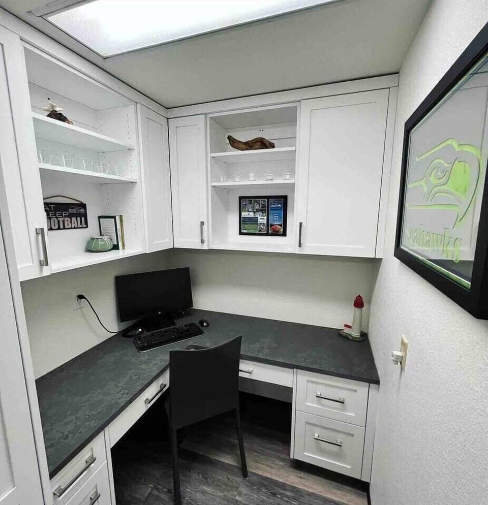 Office working space with 24-in monitor, wireless keyboard + mouse