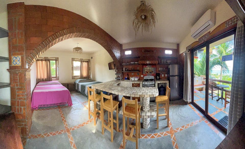 Oceanview Guesthouse, Manzanillo studio apartment | Individually decorated, individually furnished, laptop workspace