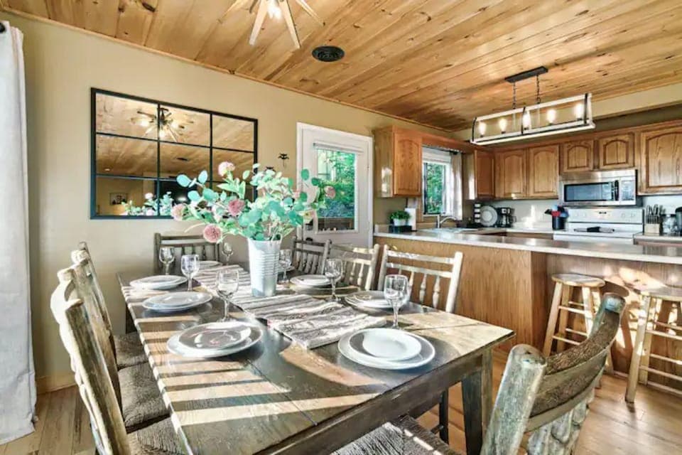 Dining area is open to kitchen. Not yet pictured-new larger 10-seat dining table