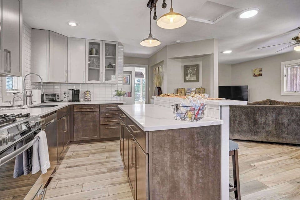 Cook and connect in this open-concept kitchen with a spacious island perfect for meal prep and gatherings.