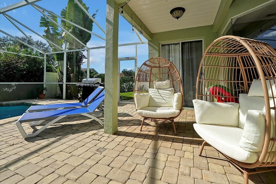 Relax on the lanai on lounge chairs, egg chairs, or on the sectional couch