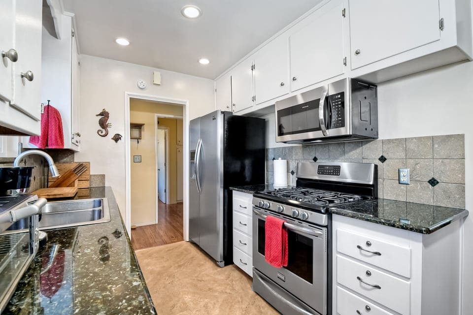 Galley kitchen with all modern appliances