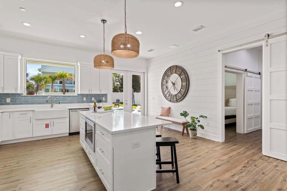 Cozy living area w/ TV, comfortable sofas, and a relaxed gathering space.