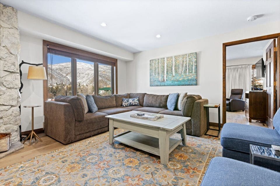 Bright inviting living area with fireplace