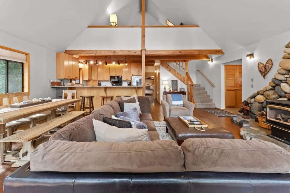 The bright and inviting main level boasts a living room/dining/kitchen that seamlessly blends together in an open layout.