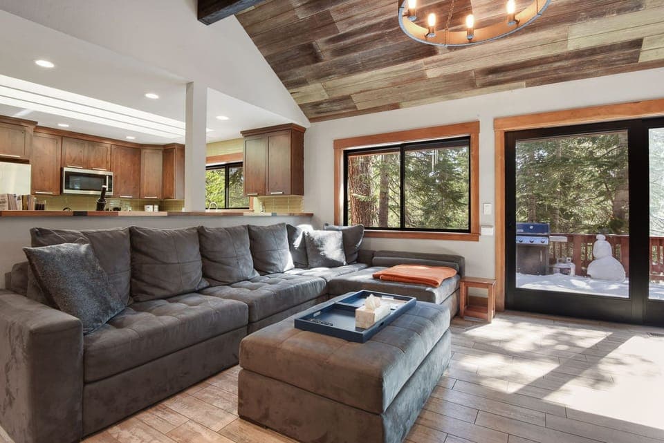 Living Room space along with 75" Smart TV and Indoor Fireplace!