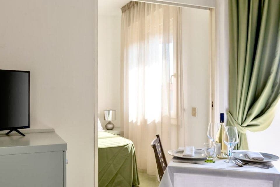 Studio | Living area | 24-inch flat-screen TV with cable channels