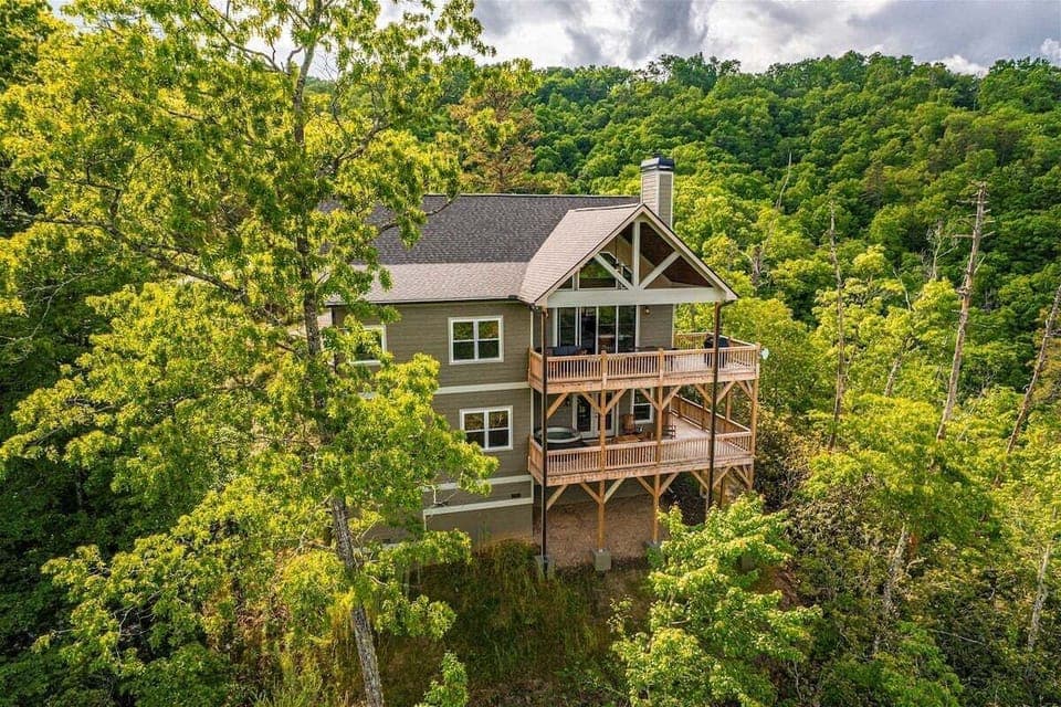 Exterior view of Fontana Grace showcasing its multi-level modern design and decks overlooking Lake Fontana.
