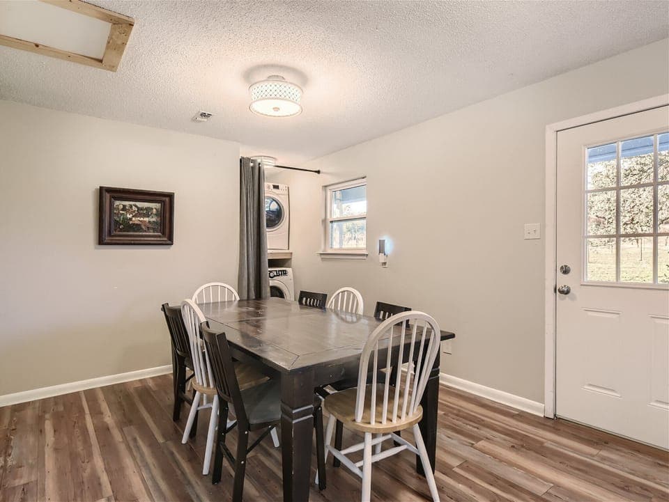Ranch house dining table and laundry area