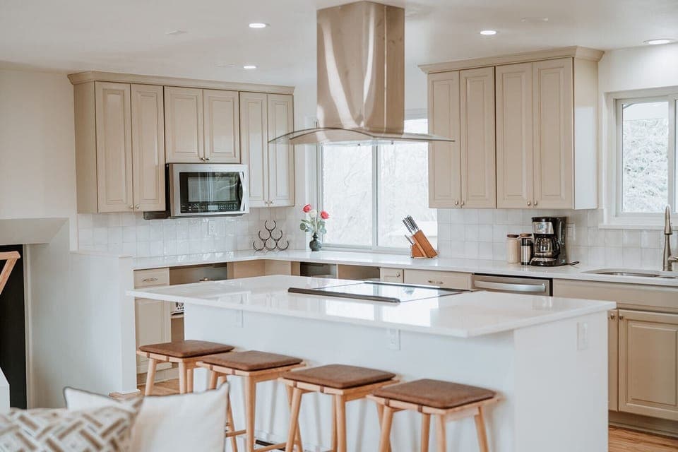 - Whip up your favorites in this modern, sunlit kitchen stocked with essentials
- Gather around the spacious island for meals, laughs, or a glass of wine
- Clean, stylish space that makes staying in feel like the best part of the trip

