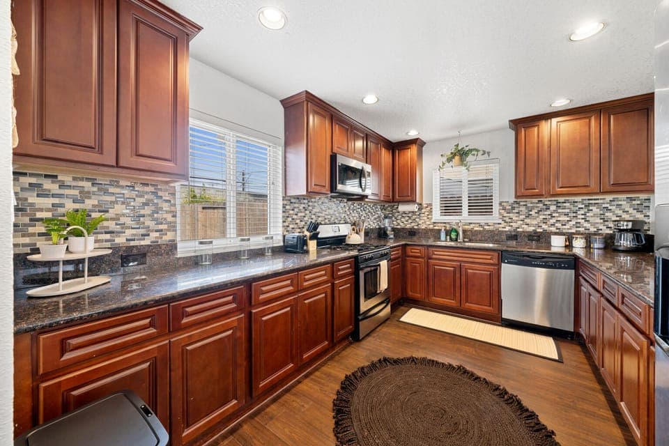 Make a masterful meal in this large kitchen; easy to navigate and serve.