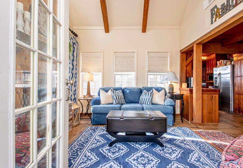 {Living Room #2} Enjoy the Cozy Charm of the Vaulted Ceiling and Vintage Wood Accents