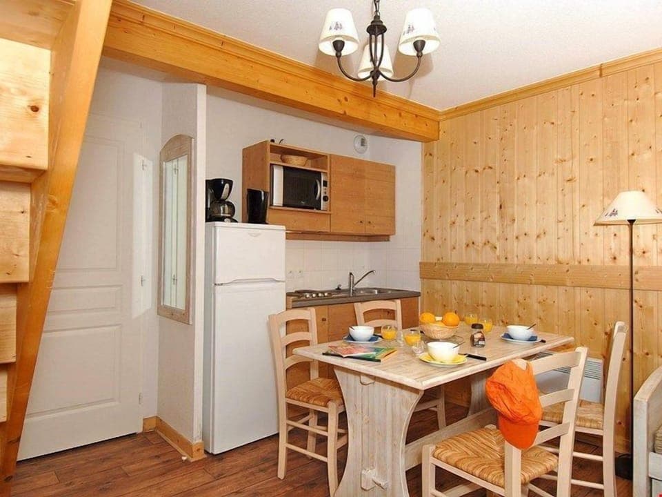 The spacious 3 Bedroom Apartment at the Residence Les Chalets de l'Arvan II by Odalys sleeps up to 9 people and comes complete with a functional kitchenette