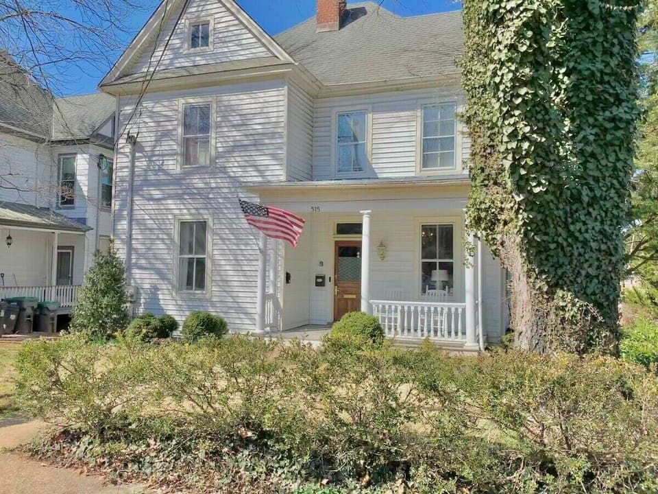 Exterior- house sits on a safe, residential street just minutes from the historic Downtown business district! The porch is a great place for coffee or cocktail chats and there are always plenty of dog walkers/runners/cyclists going by!
