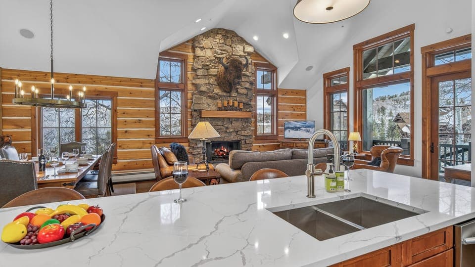 Kitchen, Main Level - Island overlooking great room with fireplace and views