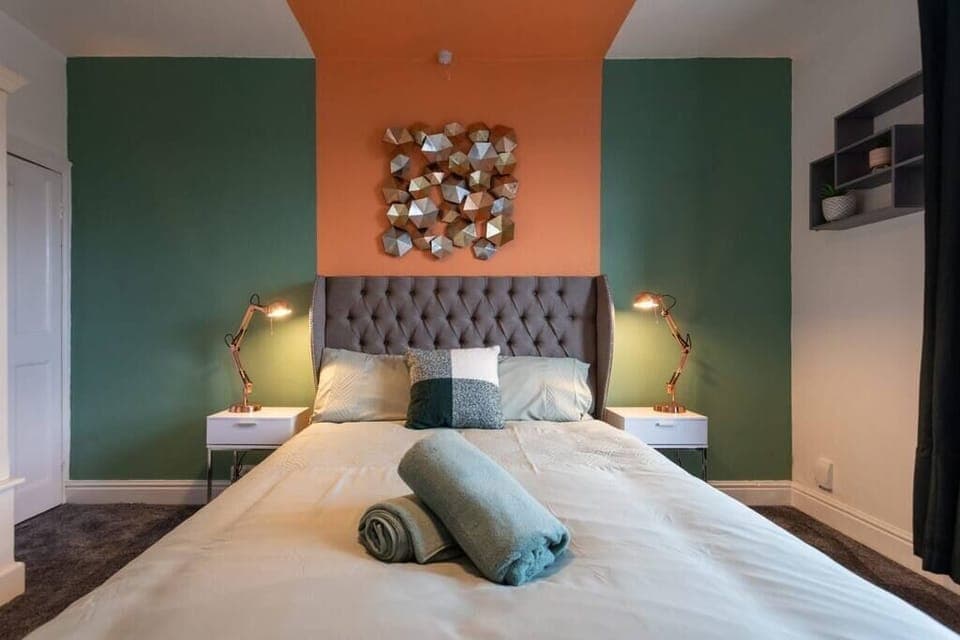 Cozy bedroom featuring a comfortable double bed, your perfect retreat for a restful night's sleep.