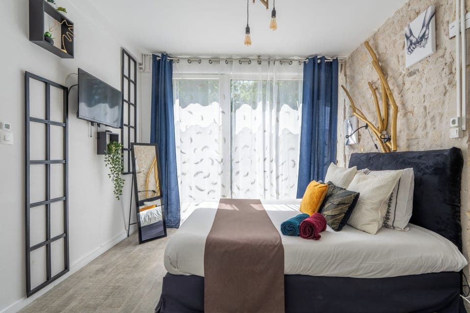 Tic Tac Room | Individually decorated, individually furnished, blackout drapes