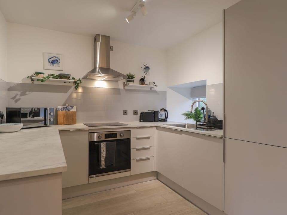 Fridge, electric kettle, toaster, cookware/dishes/utensils