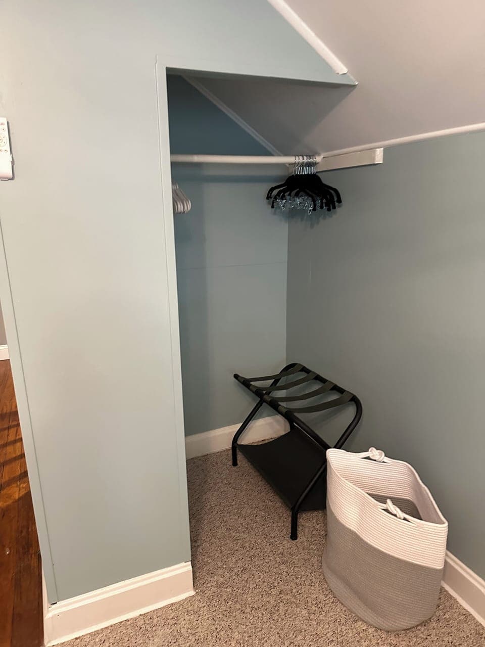 Spacious Closet, luggage rack and laundry bin.
