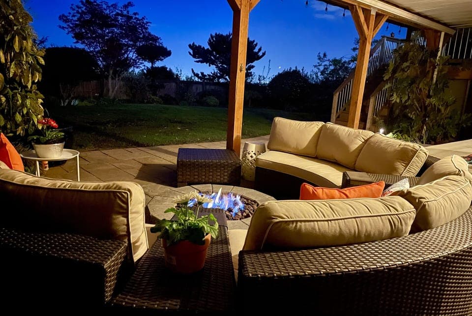 Quiet patio and fire pit to enjoy the skyline and lovely landscaping