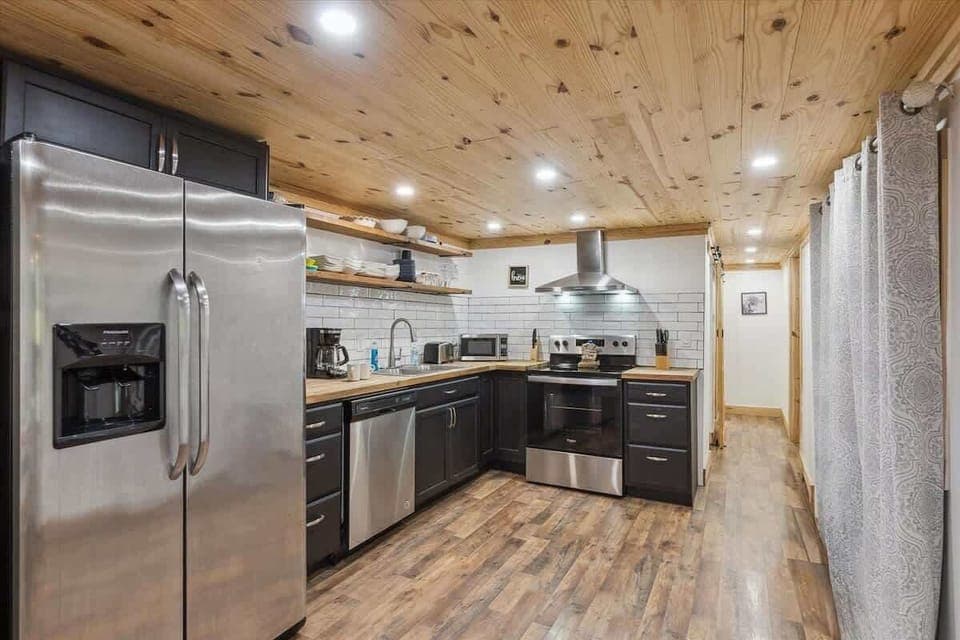 Kitchen: Modern appliances and sleek design make cooking a joy in this stylish space!