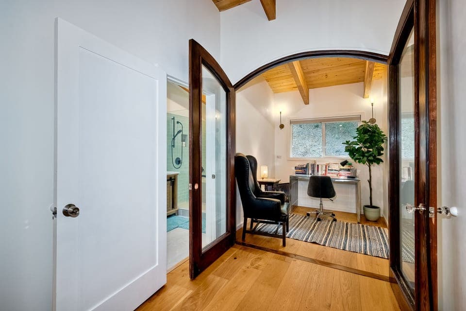 Private office with great lighting, desk, and chair