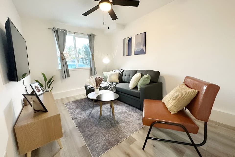 Cozy living room with a comfortable pull out couch. 50 in. smart TV with Roku installed