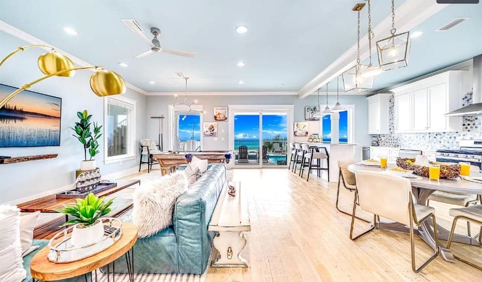 Your bright open-concept living space flows seamlessly from kitchen to ocean views, perfect for gathering and creating memories.