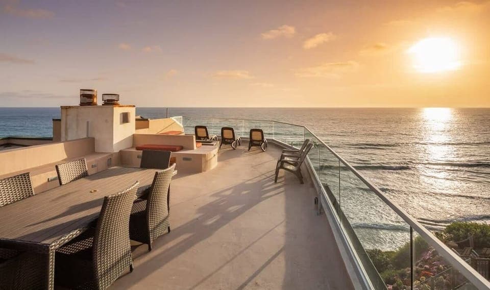  Relax in the sun loungers on the Private Roof Top!  Enjoy the Fire pit, outdoor dining area and BBQ Grill. Amazing Panoramic Ocean  views!