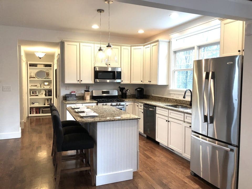 Open concept kitchen/living room/dining area. Fully stocked kitchen.