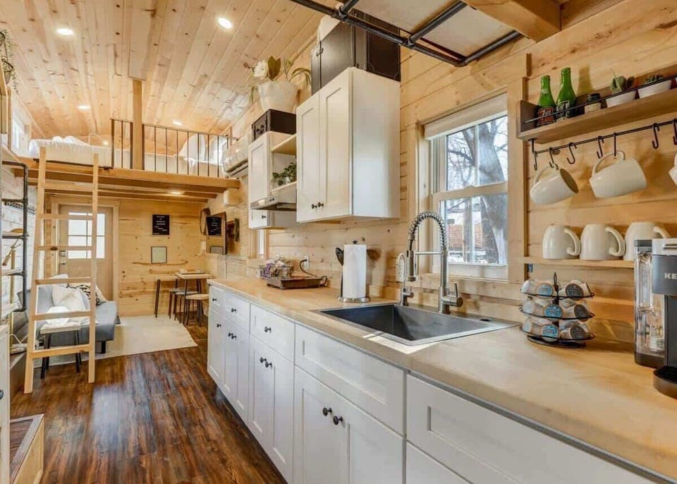 Savor the ease of centralized design: enjoy home amenities while cooking in our convenient kitchen.