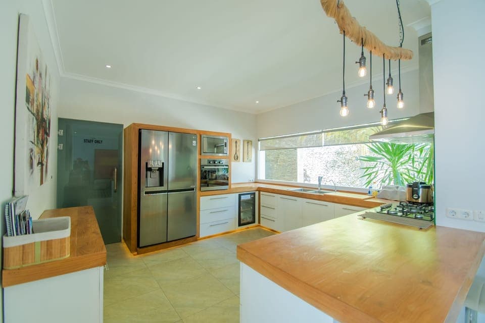 Villa | Private kitchen | Fridge, microwave, oven, stovetop