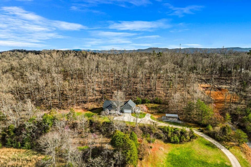 The house is located on a private hill in a quiet neighborhood in Kodak, TN.