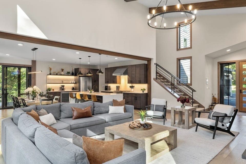 Great Room – Natural light, designer seating, and seamless flow to kitchen and dining.