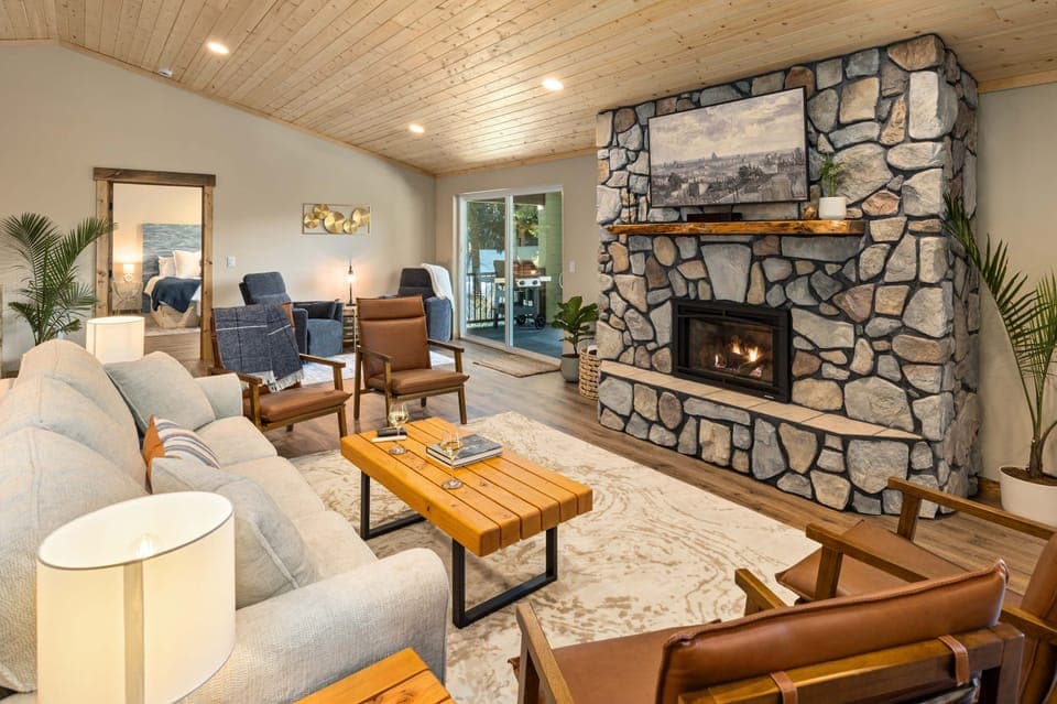 Gorgeous living room with a gas fireplace, Smart TV, and cozy seating.