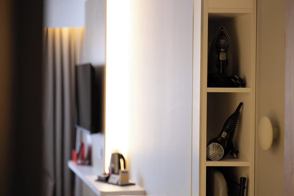 Desk, laptop workspace, blackout drapes, soundproofing