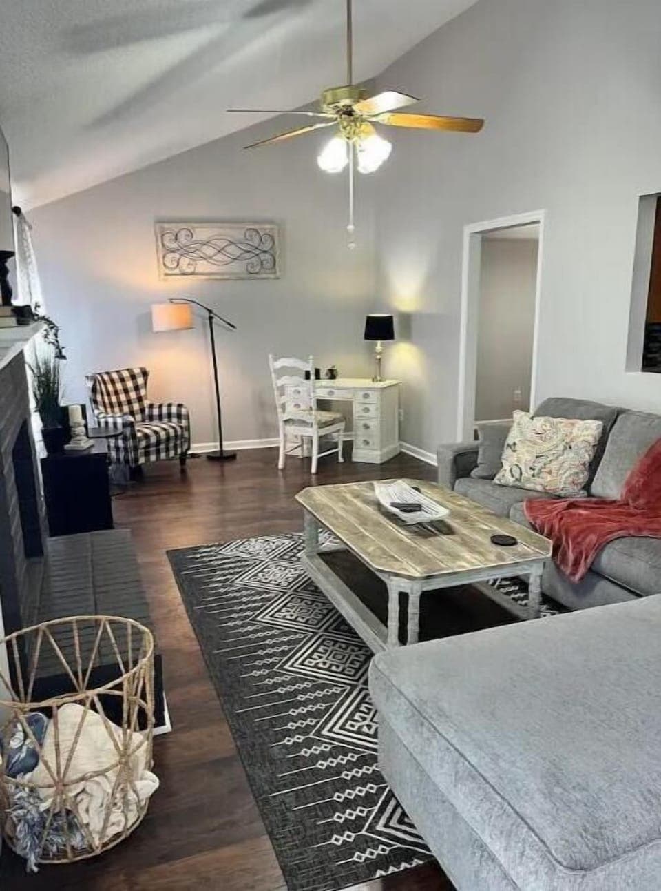 Living room with desk and reading chair