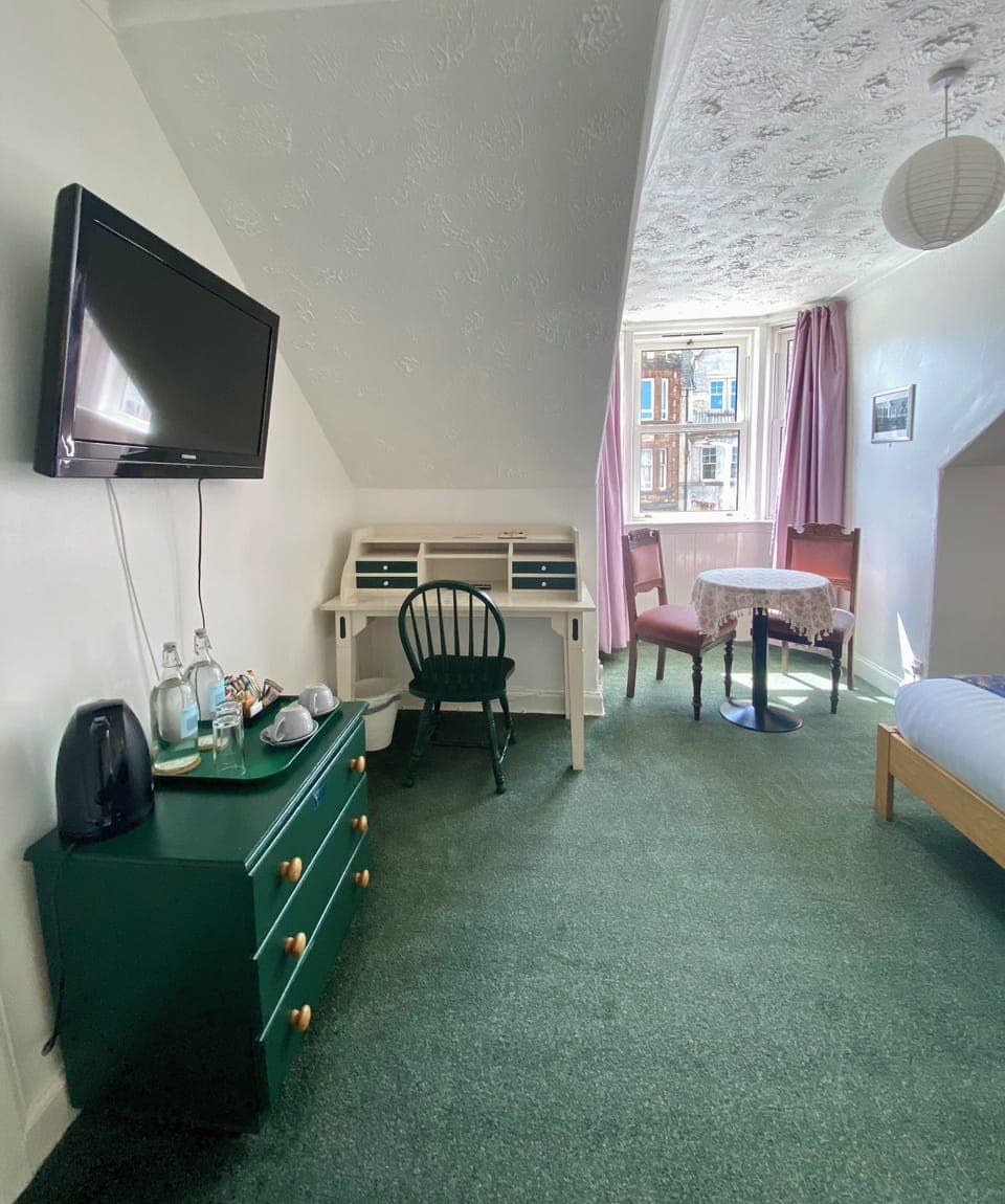 Economy Double Room with Shared Bathroom | Desk, blackout drapes, iron/ironing board, free WiFi