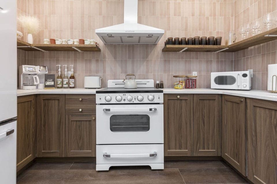 Kitchen with basic cookware and utensils. Comes with cups and glasses and plates. Complimentary breakfast includes custom hollyhock blend coffee from local roaster, k-cups, and tea. Breakfast bars, oatmeal, and popcorn are there for your enjoyment!