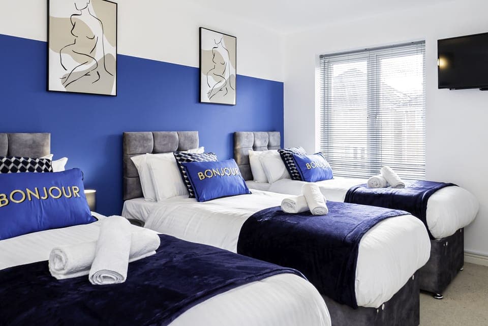 Enjoy a restful sleep in a well-appointed bedroom with quality linens and calming decor.