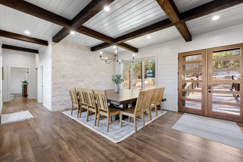 Large dining room table located by front entryway