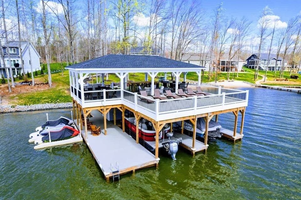 Your family will enjoy our large private lakefront lot with ~300' of waterfront property, a private sandy beach, amazing private 2 story dock and boat house with large comfy lounge area for relaxation!