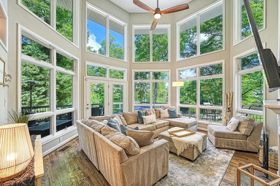 Best room in the house! Gorgeous floor-to-ceiling windows with lake & cove views