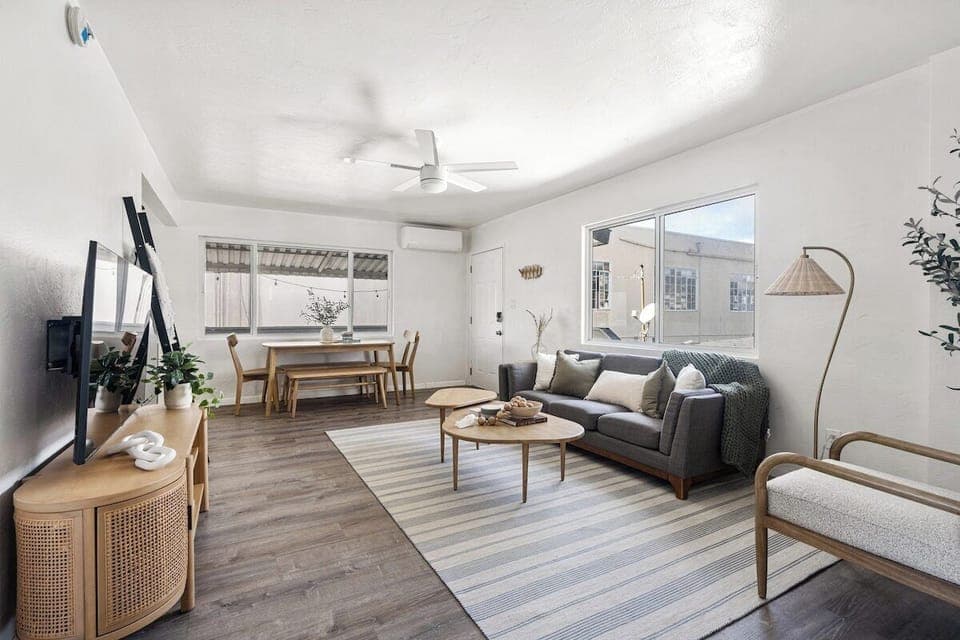 A comfy, cozy Boho inspired room with lots of natural lighting, a brand new Samsung smart tv, and AC/Heat!