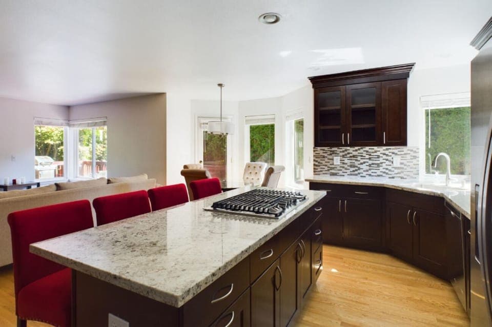 Kitchen with family room and plenty of seating.