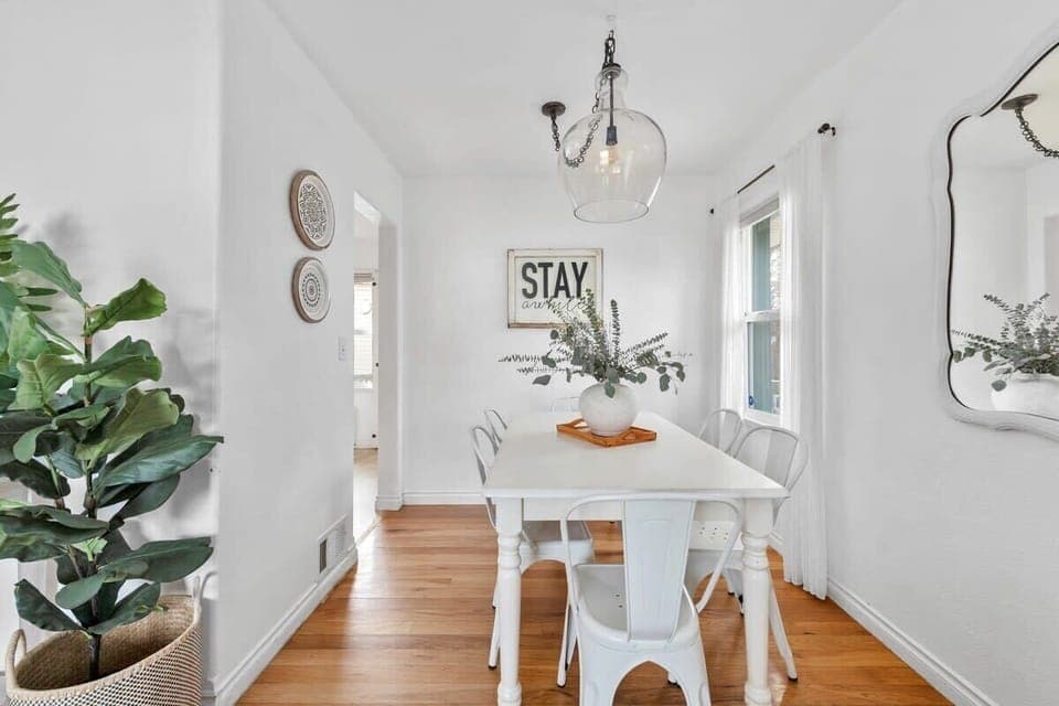 The dining table seats up to 6 guests, the perfect place to gather for home-cooked meals.