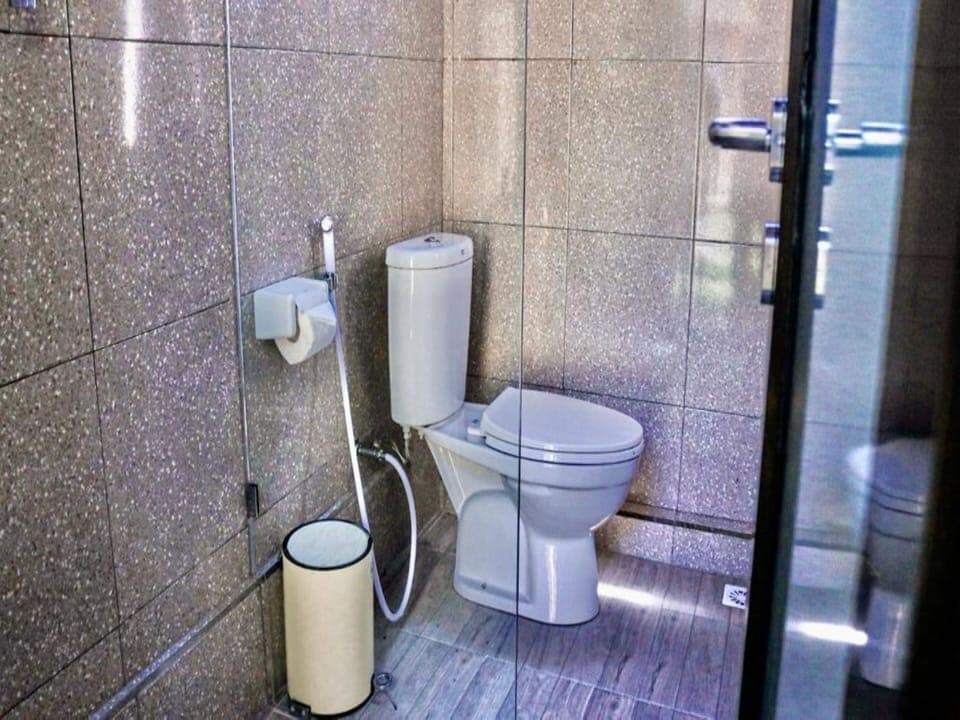 Standard Suite | Bathroom | Shower, bidet, towels, toilet paper